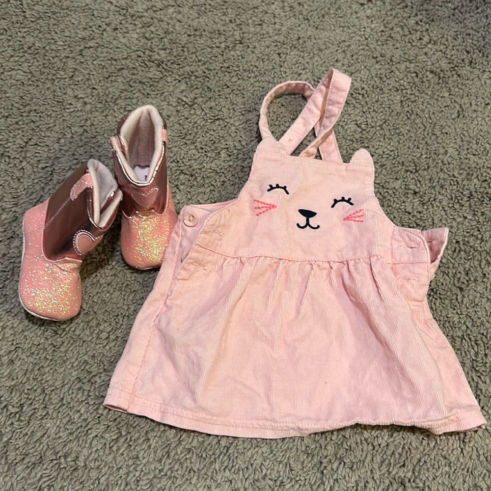 Carter’s onesie and sparkly cowboy boots.